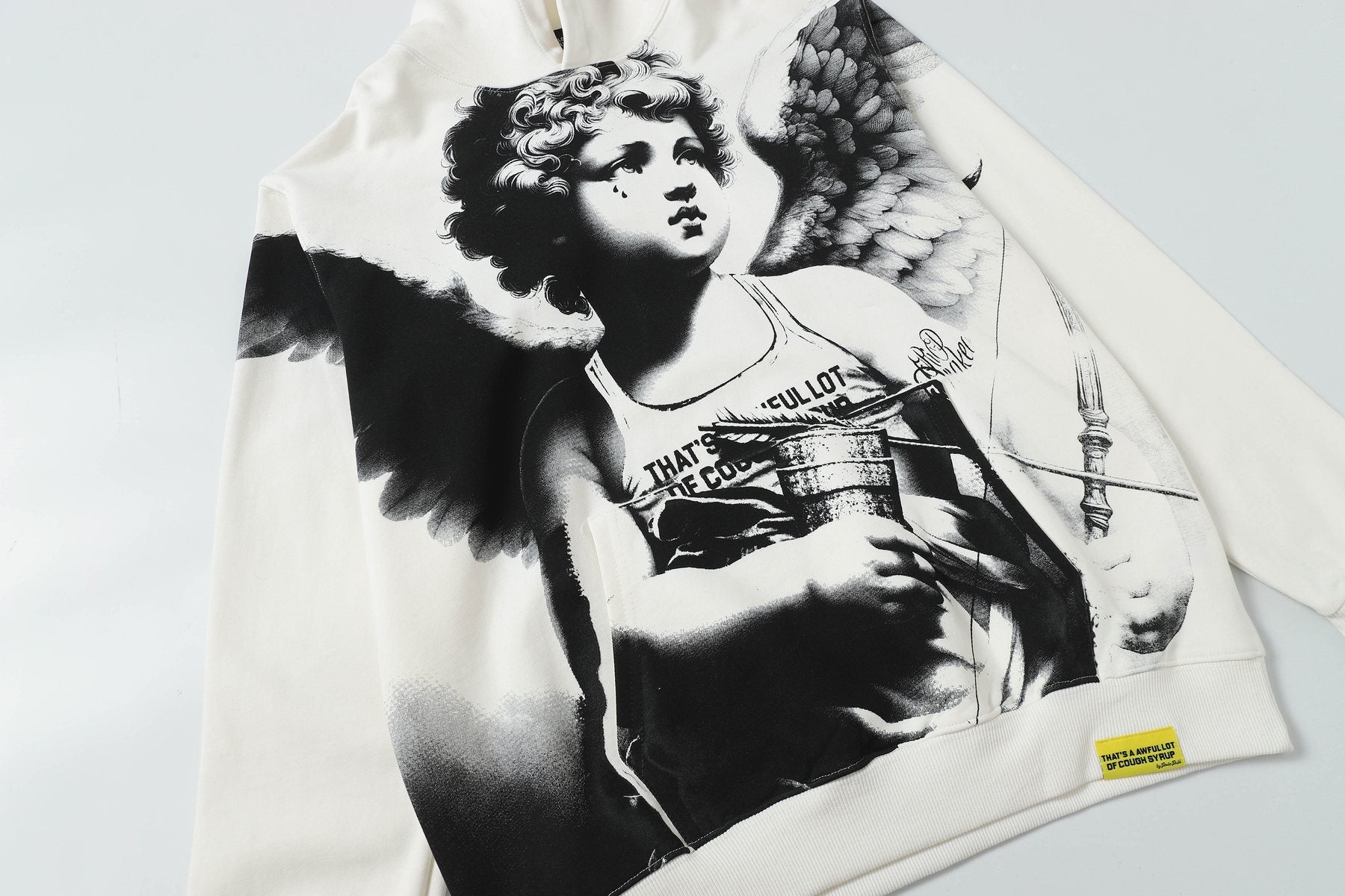 THAT'S A AWFUL LOT OF COUGH SYRUP Angel Graphic Hoodie — detail